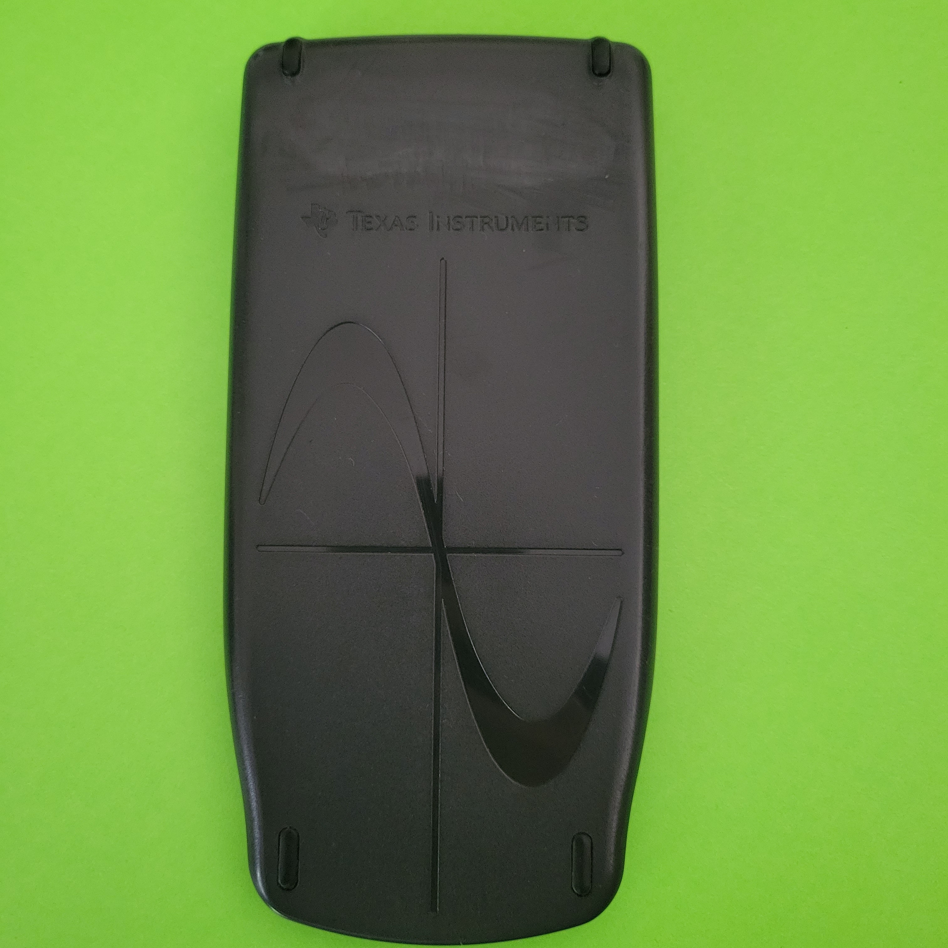 An image of the case of a texas instruments ti83 graphing calculator